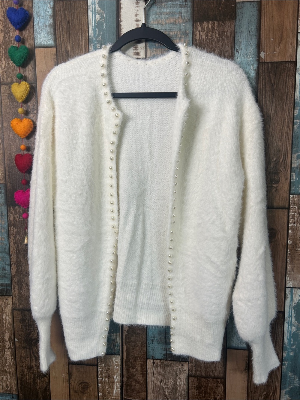Soft white with pear detail open sweater